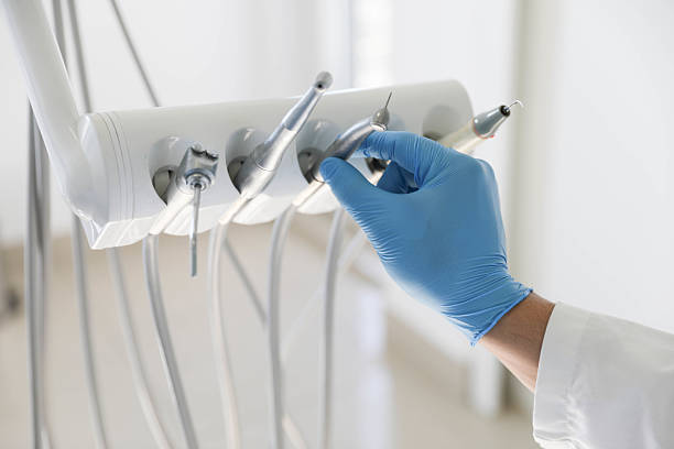 Professional Tooth Extraction technician working in The Hills, TX